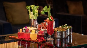 Table of drinks of Bloody Mary and Mimosa.