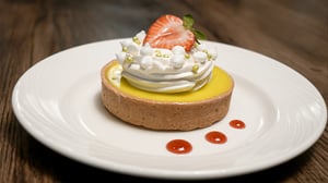 A dessert serving of a Key Lime Tart with chantilly cream and strawberry.