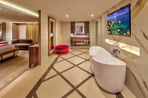 Photo of bathroom vanity and tub in the Diplomat Suite at Grand Sierra Resort in Reno, Nevada.