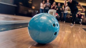 Let it Roll daily promotion package. Image of blue bowling ball thrown down the lane.