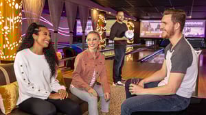 photo of Kingpin VIP Lanes & Lounge friends talking and relaxing.