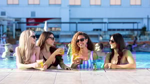 Group-of-ladies-enjoying-drinks-in-the-Infinity-Pool_q085_1920x1080